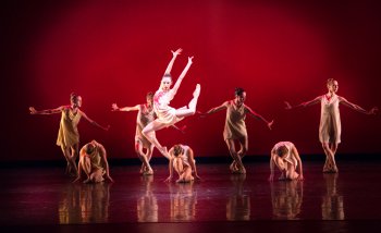 Nathalia Arja and Miami City Ballet dancers in a scene from Alexei Ratmansky’s “Symphonic Dances” (Photo credit: Sasha Iziliaev)