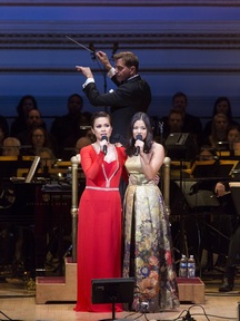 Lea Solonga and Eva Noblezada, two “Kims” from “Miss Saigon,” with maestro Steven Reineke podium in The New York Pops’ 33rd Birthday Gala entitled “ Do You Hear the People Sing” (Photo credit: Richard Termine)