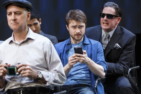 Michael Countryman, Raffi Barsoumian, Daniel Radcliffe and Red Rogers in a scene from “Privacy” now at the Public Theater (Photo credit: Joan Marcus)