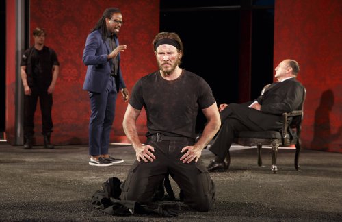Andrew Chaffee (Margareton), Maurice Jones (Paris), Bill Heck (Hector) and Miguel Perez (King Priam) in a scene from “Troilus and Cressida” (Photo credit: Joan Marcus)
