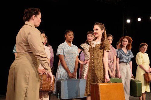 Emily McAleesjergins as MP Peggy (far left) and Laura Osnes as Mary Brown and cast in a scene from “Blueprint Specials” (Photo credit: Ryan Jensen)