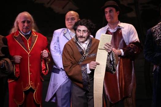 David Macaluso as Ko-Ko with his little list in a scene from New York Gilbert & Sullivan Players’ new production of “The Mikado” (Photo credit: Carol Rosegg)