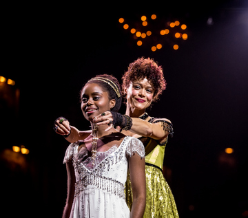 Denée Benton and Amber Gray in a scene from “Natasha, Pierre & The Great Comet of 1812” (Photo credit: Chad Batka)